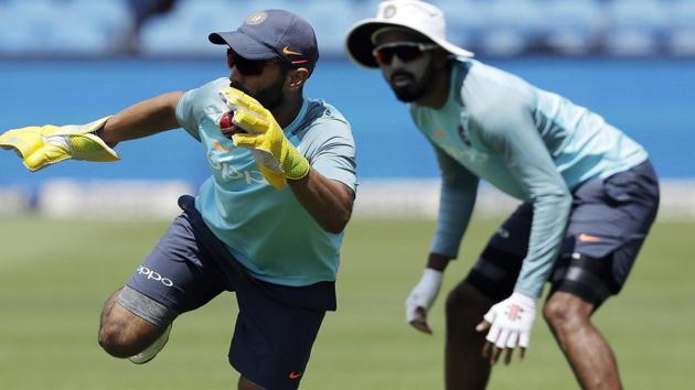 India's Dinesh Karthik, left, catches the ball during a practice session. (AP) India's Dinesh Karthik, left, catches the ball during a practice session. (AP)