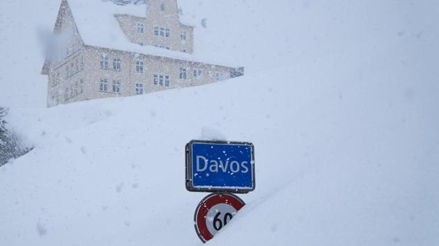 The town sign stands in the snow at the entrance to Davos, Switzerland, Monday, Jan. 22, 2018. from Jan. 23 to 26. (AP) The town sign stands in the snow at the entrance to Davos, Switzerland, Monday, Jan. 22, 2018. from Jan. 23 to 26. (AP)