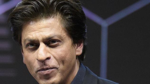 Shah Rukh Khan, displays his Crystal Award on the eve of the 48th Annual Meeting of the World Economic Forum, WEF, in Davos, Switzerland. (AP)