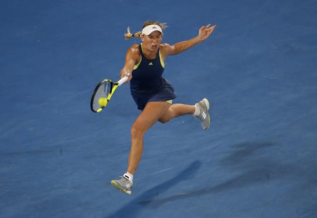 Denmark's Caroline Wozniacki defeated Spain's Carla Suarez Navarro in a quarter-final. (REUTERS) Denmark's Caroline Wozniacki defeated Spain's Carla Suarez Navarro in a quarter-final. (REUTERS)
