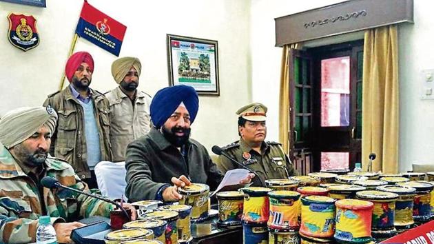 Senior superintendent of police Mandeep Singh Sidhu (centre) addressing the media in Sangrur on Tuesday. (HT Photo) Senior superintendent of police Mandeep Singh Sidhu (centre) addressing the media in Sangrur on Tuesday. (HT Photo)
