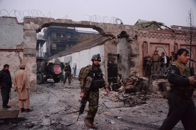 Afghan security forces inspect the site of attack on British charity Save the Children office in Jalalabad on January 24, 2018. (AFP) Afghan security forces inspect the site of attack on British charity Save the Children office in Jalalabad on January 24, 2018. (AFP)