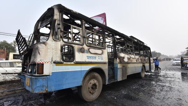 A Haryana Roadways bus was set on fire today near village Bhondsi in Gurgaon allegedly by activists of Karni Sena, who were protesting against the release of film ‘Padmaavat’. Many instances of blockades and stone pelting were also reported from Gurgaon, Mathura and Meerut. (Sanjeev Verma/HT PHOTO) A Haryana Roadways bus was set on fire today near village Bhondsi in Gurgaon allegedly by activists of Karni Sena, who were protesting against the release of film ‘Padmaavat’. Many instances of blockades and stone pelting were also reported from Gurgaon, Mathura and Meerut. (Sanjeev Verma/HT PHOTO)