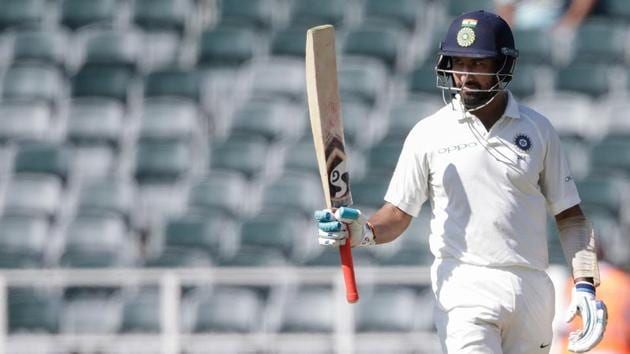 Indian cricket team’s Cheteshwar Pujara celebrates scoring a half-century during the first day of the third test against South Africa cricket team at Wanderers cricket ground on Wednesday. (AFP) Indian cricket team’s Cheteshwar Pujara celebrates scoring a half-century during the first day of the third test against South Africa cricket team at Wanderers cricket ground on Wednesday. (AFP)