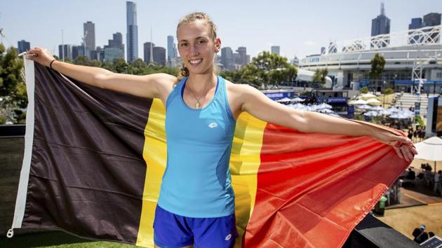 Belgium's Elise Mertens poses for a photo with her national flag at the Australian Open tennis championships in Melbourne on Wednesday. (AP) Belgium's Elise Mertens poses for a photo with her national flag at the Australian Open tennis championships in Melbourne on Wednesday. (AP)