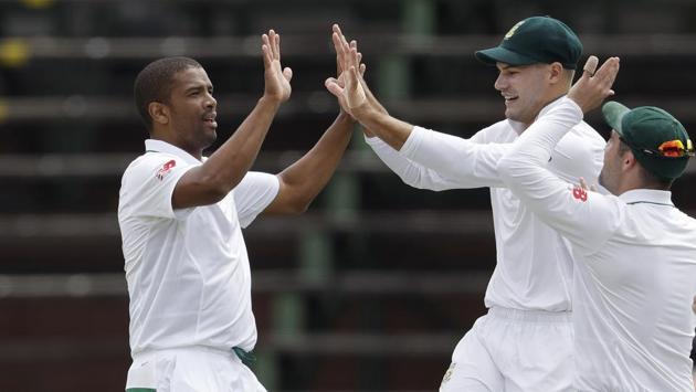 South Africa's bowler Vernon Philander (L), celebrates with teammates after dismissing India's batsman Murali Vijay, for 6 runs on the first day of the third test match between South Africa and India at the Wanderers Stadium in Johannesburg. (Themba Hadebe / AP) South Africa's bowler Vernon Philander (L), celebrates with teammates after dismissing India's batsman Murali Vijay, for 6 runs on the first day of the third test match between South Africa and India at the Wanderers Stadium in Johannesburg. (Themba Hadebe / AP)