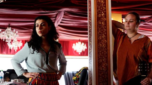 Mihaela Dragan (L) and musician Elena Albu seen in a rehearsal for a poetry night in La Tiganci (At the Gypsies’) restaurant in Bucharest. “There is need for contemporary Roma culture, because people just know the sensational things they see on TV,” said Giuvlipen member and actress Zita Moldovan. “A Roma theatre could tell stories, it would be useful for both us and the Romanian population,” she said. (Andreea Campeanu / REUTERS) Mihaela Dragan (L) and musician Elena Albu seen in a rehearsal for a poetry night in La Tiganci (At the Gypsies’) restaurant in Bucharest. “There is need for contemporary Roma culture, because people just know the sensational things they see on TV,” said Giuvlipen member and actress Zita Moldovan. “A Roma theatre could tell stories, it would be useful for both us and the Romanian population,” she said. (Andreea Campeanu / REUTERS)