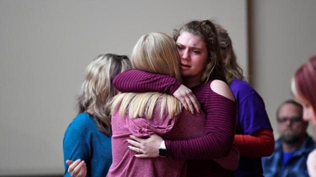 Students attend a prayer vigil for students killed and injured after a 15-year-old boy opened fire with a handgun at Marshall County High School, in Marion, Kentucky, US, on Tuesday. (REUTERS) Students attend a prayer vigil for students killed and injured after a 15-year-old boy opened fire with a handgun at Marshall County High School, in Marion, Kentucky, US, on Tuesday. (REUTERS)