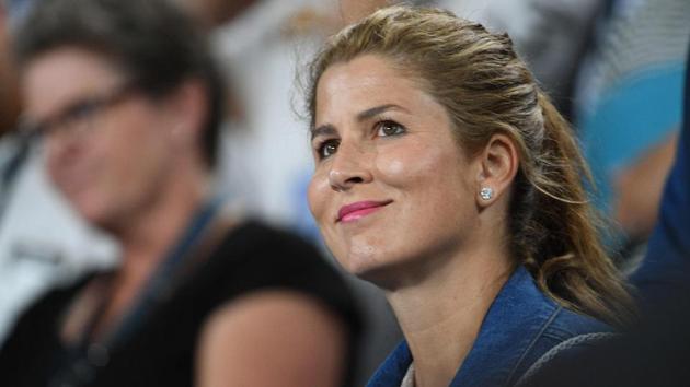 Mirka Federer, wife of Switzerland's Roger Federer, smiles as he celebrates beating Czech Republic's Tomas Berdych. (AFP)
