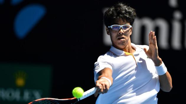 South Korea's Hyeon Chung hits a return against Tennys Sandgren in another match. (AFP)