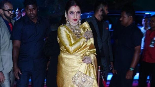 Rekha, who was given the Hall of Fame (female) award, arrives at the venue. (HT Photo)