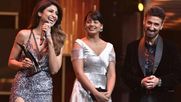 Shilpa Shetty with Rahul Dev on stage. (HT Photo)