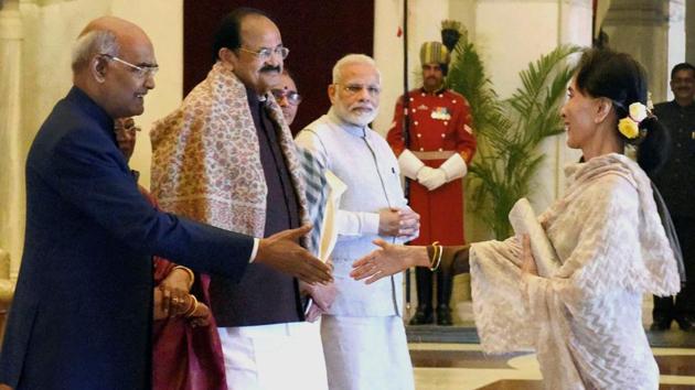President Ram Nath Kovind along with Vice-President Venkaiah Naidu and Prime Minister Narendra Modi greet Myanmar's State Counsellor Aung San Suu Kyi during a ceremonial reception of ASEAN heads at Rashtrapati Bhavan in New Delhi on Thursday. (PTI)
