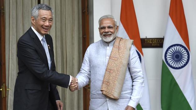 Prime Minister Narendra Modi shakes hand with Singapore's Prime Minister Lee Hsien Loong prior to their bilateral meeting on the sidelines of India-ASEAN commemorative summit at Hyderabad house in New Delhi. (Arvind Yadav/HT PHOTO) Prime Minister Narendra Modi shakes hand with Singapore's Prime Minister Lee Hsien Loong prior to their bilateral meeting on the sidelines of India-ASEAN commemorative summit at Hyderabad house in New Delhi. (Arvind Yadav/HT PHOTO)