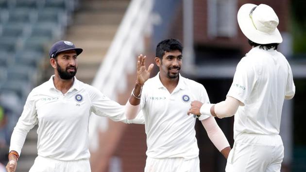 Jasprit Bumrah (C) celebrates the dismissal South Africa’s final wicket on Day 2 of third Test in Johannesburg. (AFP)