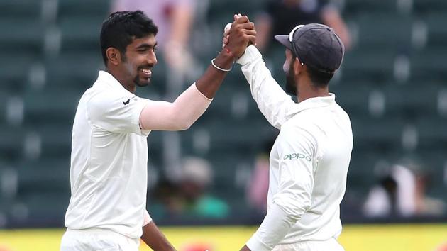 Jasprit Bumrah celebrates with Ajinkya Rahane the wicket of Lungi Ngidi on Day 2 of the third and final Test between South Africa and India at the Wanderers Stadium in Johannesburg. Follow full cricket score of India vs South Africa, third Test, Day 2 on Thursday here(BCCI)