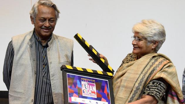 Sumitra Bhave (right) and Girish Kasaravalli inaugurate the 8th Asian Film Festival at NFAI in Pune.(SANKET WANKHADE/HT PHOTO)