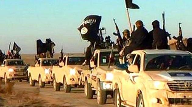 An undated photo shows Islamic State terrorists making their way to Iraq from Raqqa city in Syria. British Sikh girl Sandeep Samra made two attempts to get a passport before she was arrested last year. (Militant website via AP) An undated photo shows Islamic State terrorists making their way to Iraq from Raqqa city in Syria. British Sikh girl Sandeep Samra made two attempts to get a passport before she was arrested last year. (Militant website via AP)