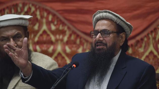 Jamaat-ud-Dawa chief Hafiz Saeed speaks during a press conference in Lahore. A UNSC team is expected to see the progress on sanctions against banned entities including those run by Saeed. (AFP) Jamaat-ud-Dawa chief Hafiz Saeed speaks during a press conference in Lahore. A UNSC team is expected to see the progress on sanctions against banned entities including those run by Saeed. (AFP)