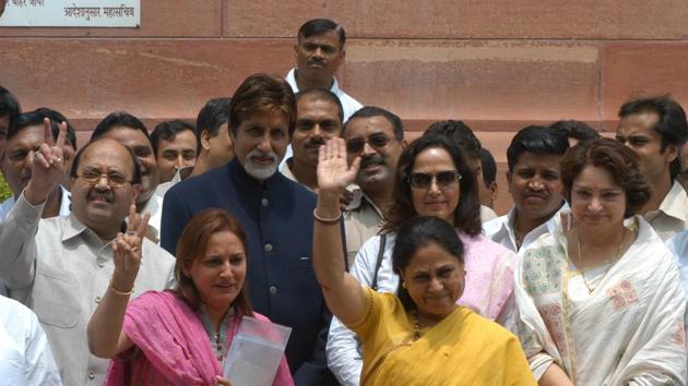 Former actors Jaya Prada, Jaya Bachchan, and Hema Malini wave to the media as they leave Parliament after the first day of the monsoon session in New Delhi in 2006 (Photo: Sunil Saxena / HT)