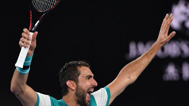 Marin Cilic celebrates beating Kyle Edmund in their men's singles semifinals on day 11 of the Australian Open tennis tournament in Melbourne on Thursday. (AFP) Marin Cilic celebrates beating Kyle Edmund in their men's singles semifinals on day 11 of the Australian Open tennis tournament in Melbourne on Thursday. (AFP)
