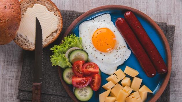 Eating a high-cholesterol diet like butter, ghee, sausages, full fat cream and yogurt may increase risk of colon cancer.(Shutterstock)
