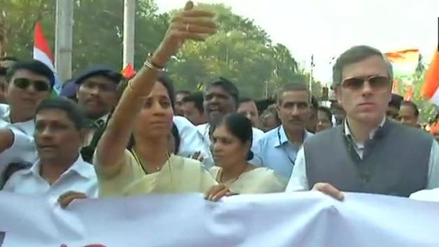 NCP’s Supriya Sule and NC leader Omar Obdullah at the “Save Constitution” march in Mumbai on Friday. NCP’s Supriya Sule and NC leader Omar Obdullah at the “Save Constitution” march in Mumbai on Friday.