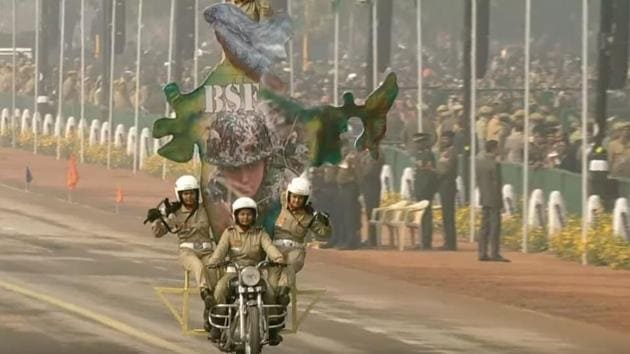 Motorcycle contingent, Seema Bhawani, comprising women personnel of the BSF, showcases their skills for the first time at the Republic Day parade in New Delhi on Friday.(Doordarshan)