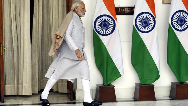 Prime Minister Narendra Modi heads into a meeting with Singapore's Prime Minister on the sidelines of India-ASEAN commemorative summit at Hyderabad house in New Delhi on Thursday. (Arvind Yadav/HT Photo) Prime Minister Narendra Modi heads into a meeting with Singapore's Prime Minister on the sidelines of India-ASEAN commemorative summit at Hyderabad house in New Delhi on Thursday. (Arvind Yadav/HT Photo)