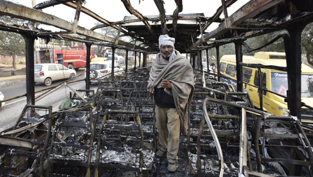 Ranvir Singh, a conductor with Haryana Roadways seen in a bus which was set on fire on Wednesday, near village Bhondsi in Gurgaon by activists of Karni Sena while protesting against the release of film ‘Padmaavat.’ (Sanjeev Verma/HT Photo) Ranvir Singh, a conductor with Haryana Roadways seen in a bus which was set on fire on Wednesday, near village Bhondsi in Gurgaon by activists of Karni Sena while protesting against the release of film ‘Padmaavat.’ (Sanjeev Verma/HT Photo)