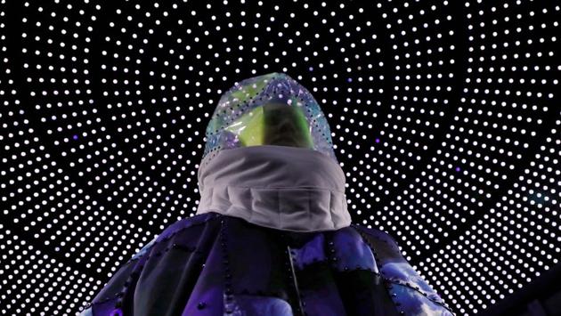 Out-of-this-world is a phrase often ascribed to haute couture, and Japanese designer Yuima Nakazato took the description literally by sending out some of his models in space suits. (Francois Guillot / AFP) Out-of-this-world is a phrase often ascribed to haute couture, and Japanese designer Yuima Nakazato took the description literally by sending out some of his models in space suits. (Francois Guillot / AFP)