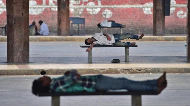 People rest up at Majestic Bus Stand during a Karnataka Bandh in Bengaluru on Thursday. Pro-Kannada organisations called a day-long statewide bandh on the issue of Mahadayi water sharing between the states of Karnataka and Goa. (PTI) People rest up at Majestic Bus Stand during a Karnataka Bandh in Bengaluru on Thursday. Pro-Kannada organisations called a day-long statewide bandh on the issue of Mahadayi water sharing between the states of Karnataka and Goa. (PTI)
