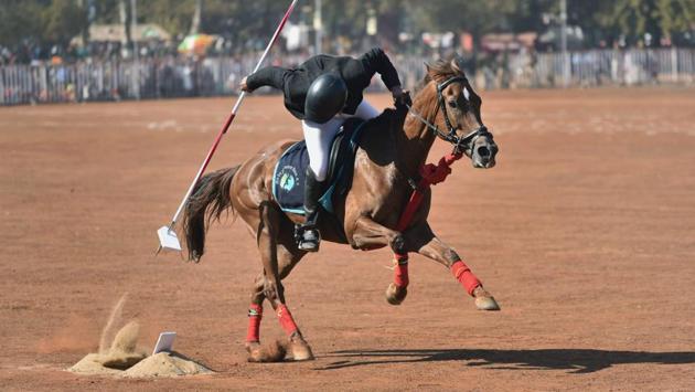 An equestrian academy player demonstrates tent pegging skills at the Lal Parade Ground in Bhopal. (PTI) An equestrian academy player demonstrates tent pegging skills at the Lal Parade Ground in Bhopal. (PTI)