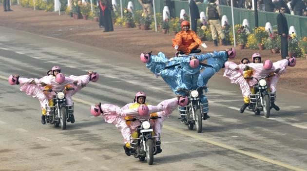 Border Security Force’s Seema Bhawani women’s daredevil team pulls off a lotus-formation during the Republic Day parade in New Delhi. Amid unprecedented security cover, celebrations of the 69th Republic Day began in New Delhi, with Prime Minister Modi and three Service Chiefs paying homage at the Amar Jawan Jyoti. This was followed by the arrival of the 10 ASEAN heads of state as chief guests and the big draw –the Republic Day Parade. (Ajay Aggarwal / HT Photo)