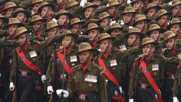 An Army contingent passes through the saluting base at Rajpath during the full dress rehearsal for the Republic Day Parade in New Delhi on Tuesday. (Mohd Zakir/HT Photo) An Army contingent passes through the saluting base at Rajpath during the full dress rehearsal for the Republic Day Parade in New Delhi on Tuesday. (Mohd Zakir/HT Photo)