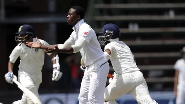 South Africa cricket team's Kagiso Rabada (centre) looks on as Indian cricket team's Bhuvneshwar Kumar (left) and Ajinkya Rahane take a run on the third day of the third Test at the Wanderers Stadium in Johannesburg on Friday. (AP) South Africa cricket team's Kagiso Rabada (centre) looks on as Indian cricket team's Bhuvneshwar Kumar (left) and Ajinkya Rahane take a run on the third day of the third Test at the Wanderers Stadium in Johannesburg on Friday. (AP)
