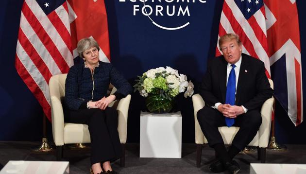 US President Donald Trump meets Britain's Prime Minister Theresa May on the sidelines of the World Economic Forum (WEF) in Davos. (AFP) US President Donald Trump meets Britain's Prime Minister Theresa May on the sidelines of the World Economic Forum (WEF) in Davos. (AFP)