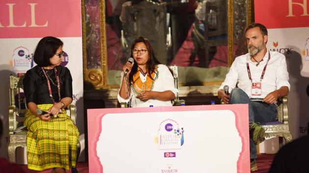Peter Bos (R) and Phejin Konyak (C) introduced by Ma Thida during ‘The Last of the Tattooed Headhunters’ session at Diggi Palace. (Raj K Raj / HT Photo) Peter Bos (R) and Phejin Konyak (C) introduced by Ma Thida during ‘The Last of the Tattooed Headhunters’ session at Diggi Palace. (Raj K Raj / HT Photo)