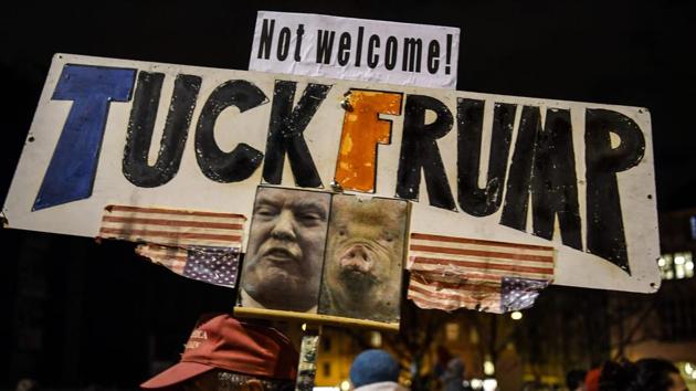 People protest against the attendance of the US president to the upcoming Davos World Economic Forum, on January 23, 2018 in Zurich. (Phillippe Desmazes / AFP) People protest against the attendance of the US president to the upcoming Davos World Economic Forum, on January 23, 2018 in Zurich. (Phillippe Desmazes / AFP)
