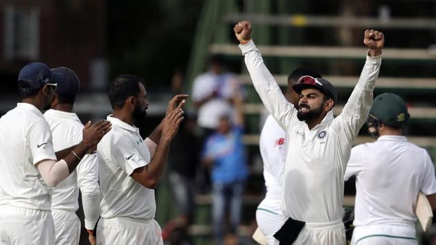 Indian cricket team captain Virat Kohli celebrates with teammates after winning the third Test vs South Africa cricket team in Johannesburg on Saturday.(AP)