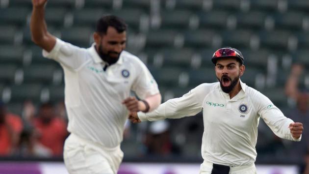 Mohammed Shami celebrates with Virat Kohli the wicket of Vernon Philander on Day 4 of the third and final Test between South Africa and India Johannesburg. Catch full cricket score of IND vs SA here(REUTERS)