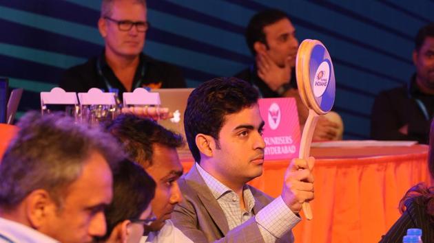 Mumbai Indians’ first buy of the day was Kieron Pollard for Rs.5.4 crore. The image shows Akash Ambani bidding for Shikhar Dhawan, who was eventually bought by Sunrisers Hyderabad. (BCCI)