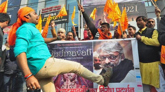 Protesters shout slogans against director Sanjay Leela Bhansali after the release of Padmaavat at a cinema hall in Patna. (PTI) Protesters shout slogans against director Sanjay Leela Bhansali after the release of Padmaavat at a cinema hall in Patna. (PTI)