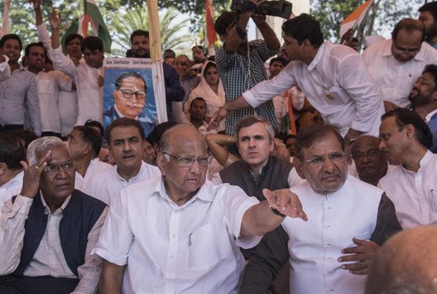 From left) CPI’s D Raja, NCP chief Sharad Pawar, expelled JD(U) leader Sharad Yadav and others at the rally on Friday.(HT photo)