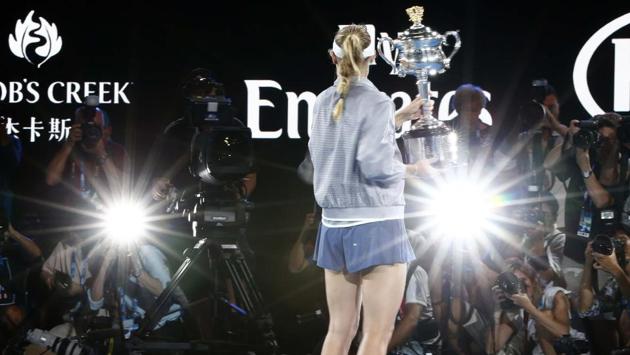 Caroline Wozniacki poses with the Australian Open trophy after beating Simona Halep in the women’s singles final on Saturday. (REUTERS) Caroline Wozniacki poses with the Australian Open trophy after beating Simona Halep in the women’s singles final on Saturday. (REUTERS)