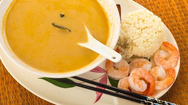 Large bowl of Thai Coconut Soup (Tom Kha Phak) served with steamed rice and shrimp. (Shutterstock) Large bowl of Thai Coconut Soup (Tom Kha Phak) served with steamed rice and shrimp. (Shutterstock)