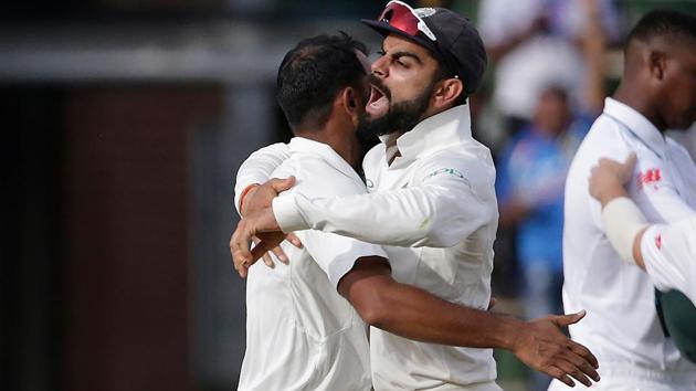 India captain Virat Kohli (R) celebrates with teammates after winning the third Test against South Africa at Wanderers in Johannesburg on Saturday.(AFP)