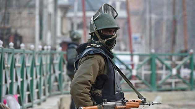A paramilitary trooper stands guard in Srinagar on January 25, 2018. (AFP Photo) A paramilitary trooper stands guard in Srinagar on January 25, 2018. (AFP Photo)