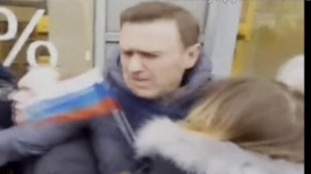 A still image taken from a video footage shows Russian opposition leader Alexei Navalny being detained by interior ministry members during a rally for a boycott of a March 18 presidential election in Moscow, Russia.(Reuters)
