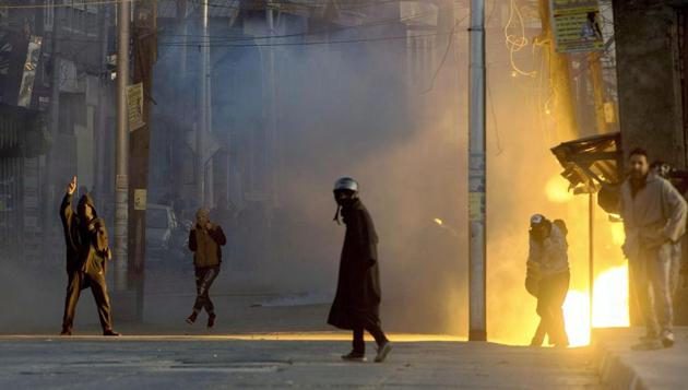 A tear-gas shell explodes as the protesters clash with security forces over the killing of two youths in an alleged Army firing in Shopian district, in Srinagar on Sunday. (PTI Photo) A tear-gas shell explodes as the protesters clash with security forces over the killing of two youths in an alleged Army firing in Shopian district, in Srinagar on Sunday. (PTI Photo)